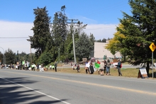 Looking accross Sooke road at protesters along the EMCS boulevard