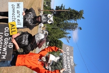 Protestors with animal head dresses