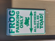 sign "frog parking all others will be toad"