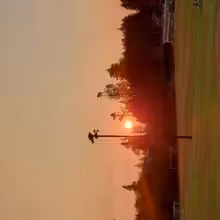Sunrise over EMCS through forest fire smoke